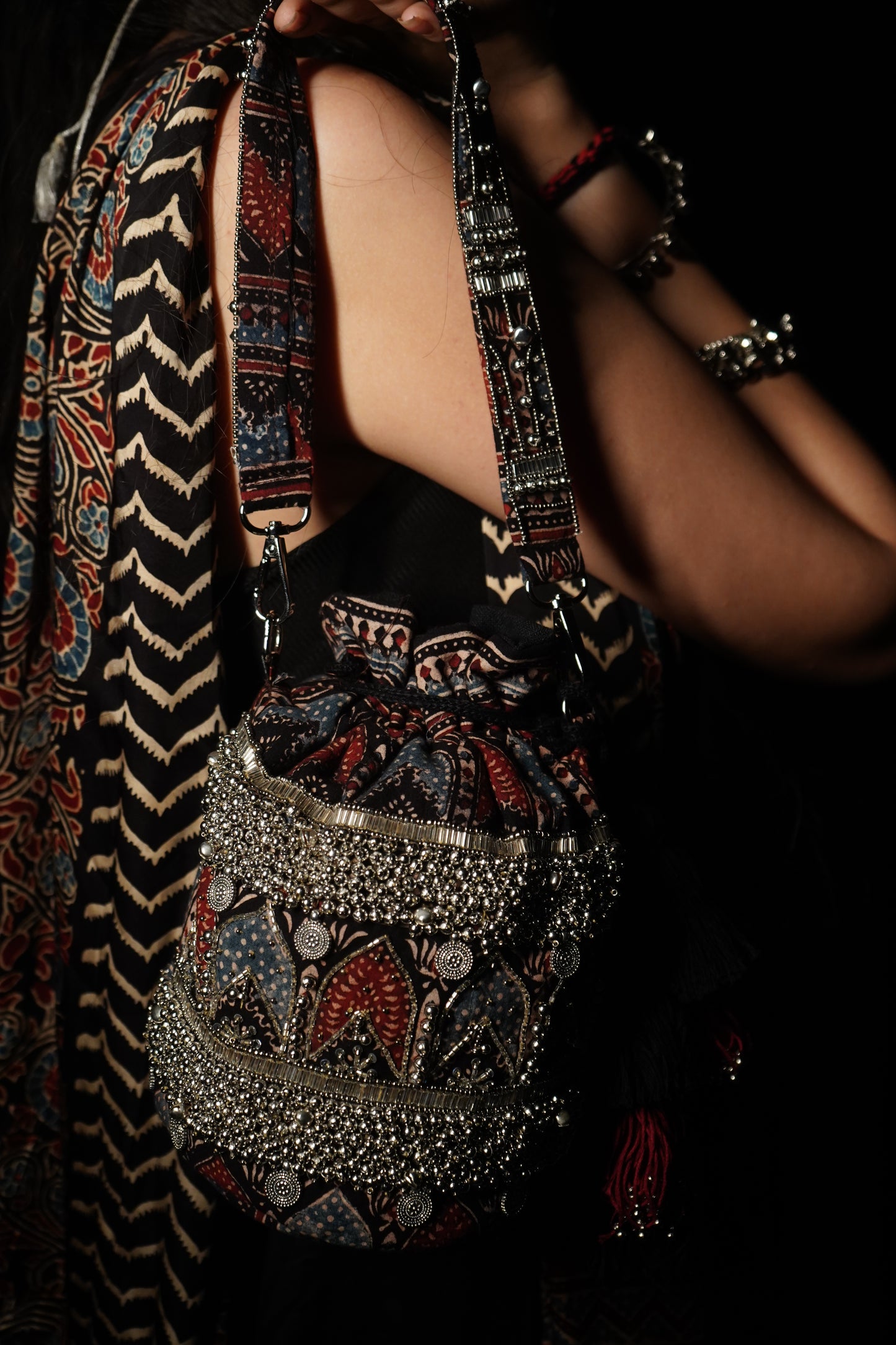 Tribal Royalty- Signature Silver Tonned Potli Bag