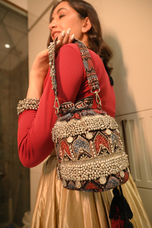 Tribal Royalty- Signature Silver Tonned Potli Bag